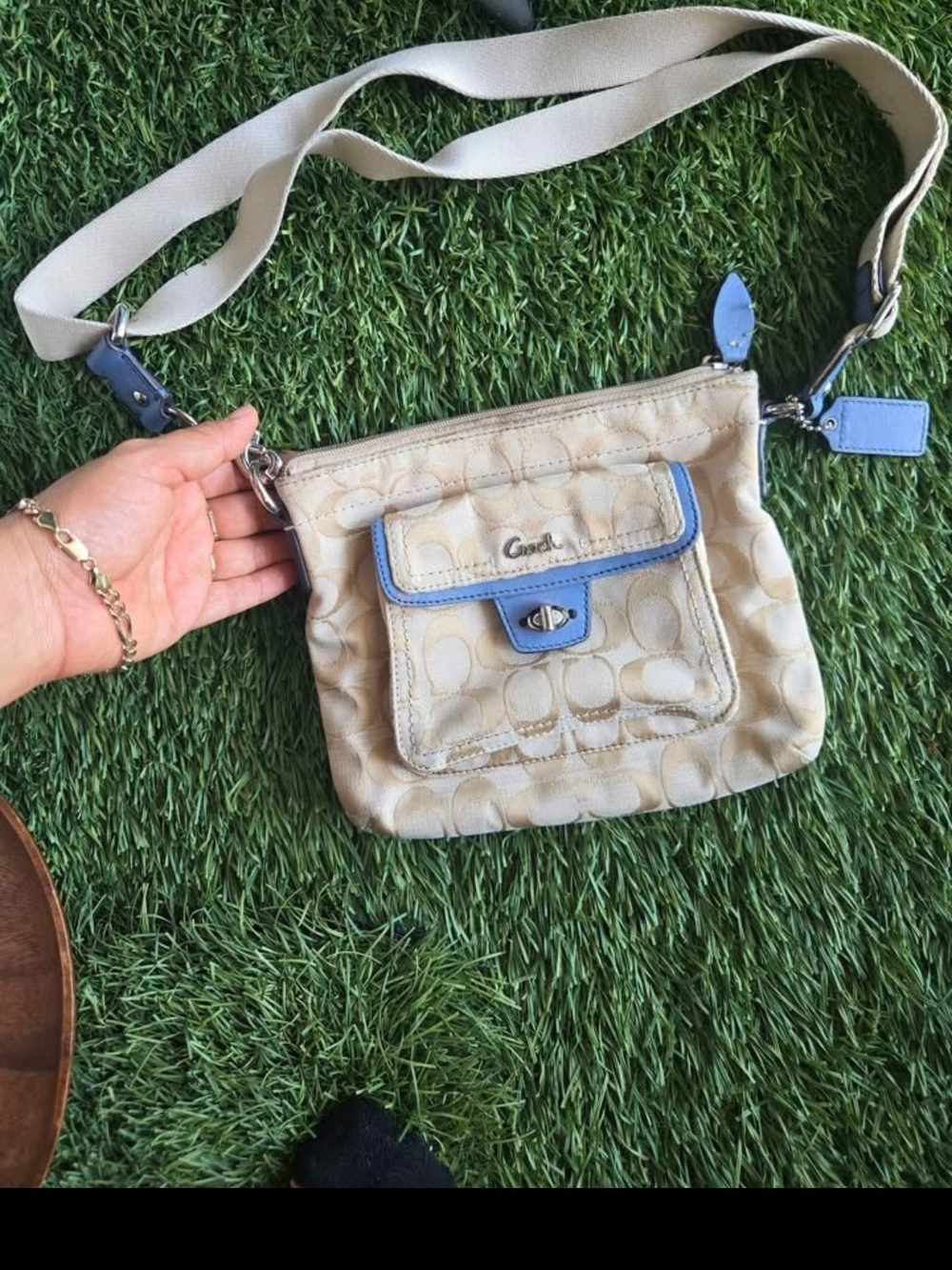 COACH Signature Penelope Turnlock Swingpack.